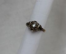 A diamond cluster ring,