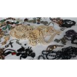 Assorted costume jewellery, including faux pearls, beaded necklaces,