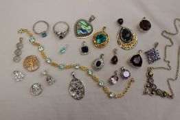 Assorted silver and silver gilt gem set pendants, rings,