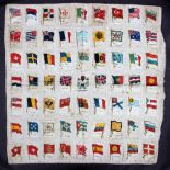 A World War I panel, embroidered with silk cigarette cards depicting flags,