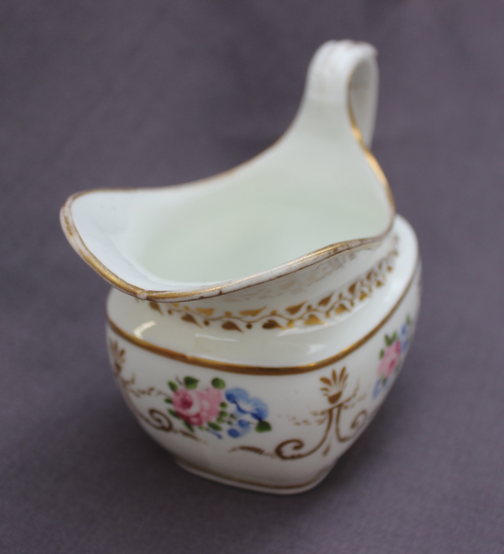 A Swansea porcelain cream jug, painted with roses and gilt swags and a scrolling handle, - Bild 5 aus 6