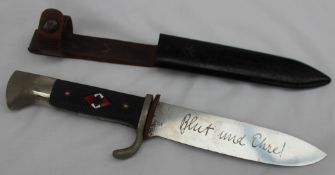 A Hitler youth dagger, with a bakelite grip, enamelled swastika and plated mounts,
