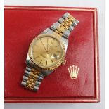 A Gentleman's Rolex Oyster perpetual datejust superlative chronometer, with a two tone strap,