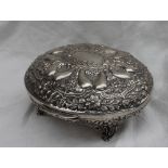 An Indian white metal lidded bowl of oval form,