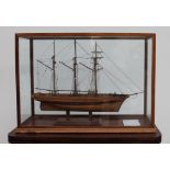 A scratch built model Ship, the "Rhoda Mary" contained in a glazed case, 84.