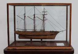 A scratch built model Ship, the "Rhoda Mary" contained in a glazed case, 84.