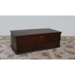An 18th century oak bible box, the rectangular hinged top enclosing a two division candle box,
