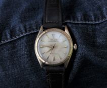 A Gentleman's Rolex Oyster-perpetual officially certified chronometer with a cream coloured dial