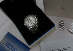 A Seiko chronograph 100M Gentleman's wristwatch, the silvered dial with batons,