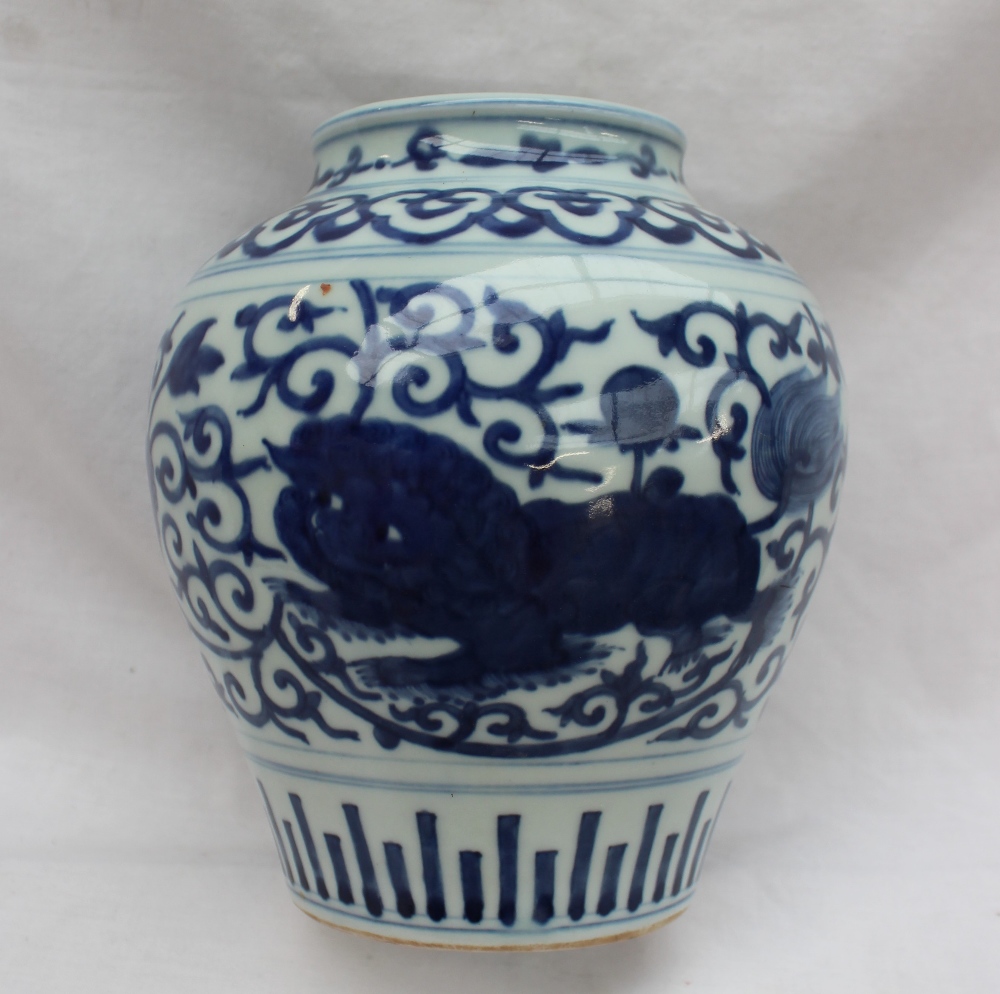 A Chinese blue and white porcelain inverted baluster vase, - Bild 2 aus 6