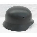 A German World War II helmet,