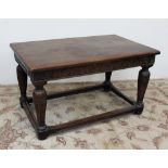 An 18th century style oak refectory table,