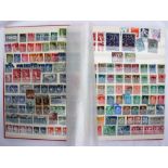 A Stamp album, containing world stamps, from the early 20th century including Aden, Ceylon, India,