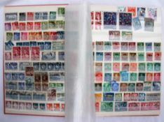 A Stamp album, containing world stamps, from the early 20th century including Aden, Ceylon, India,