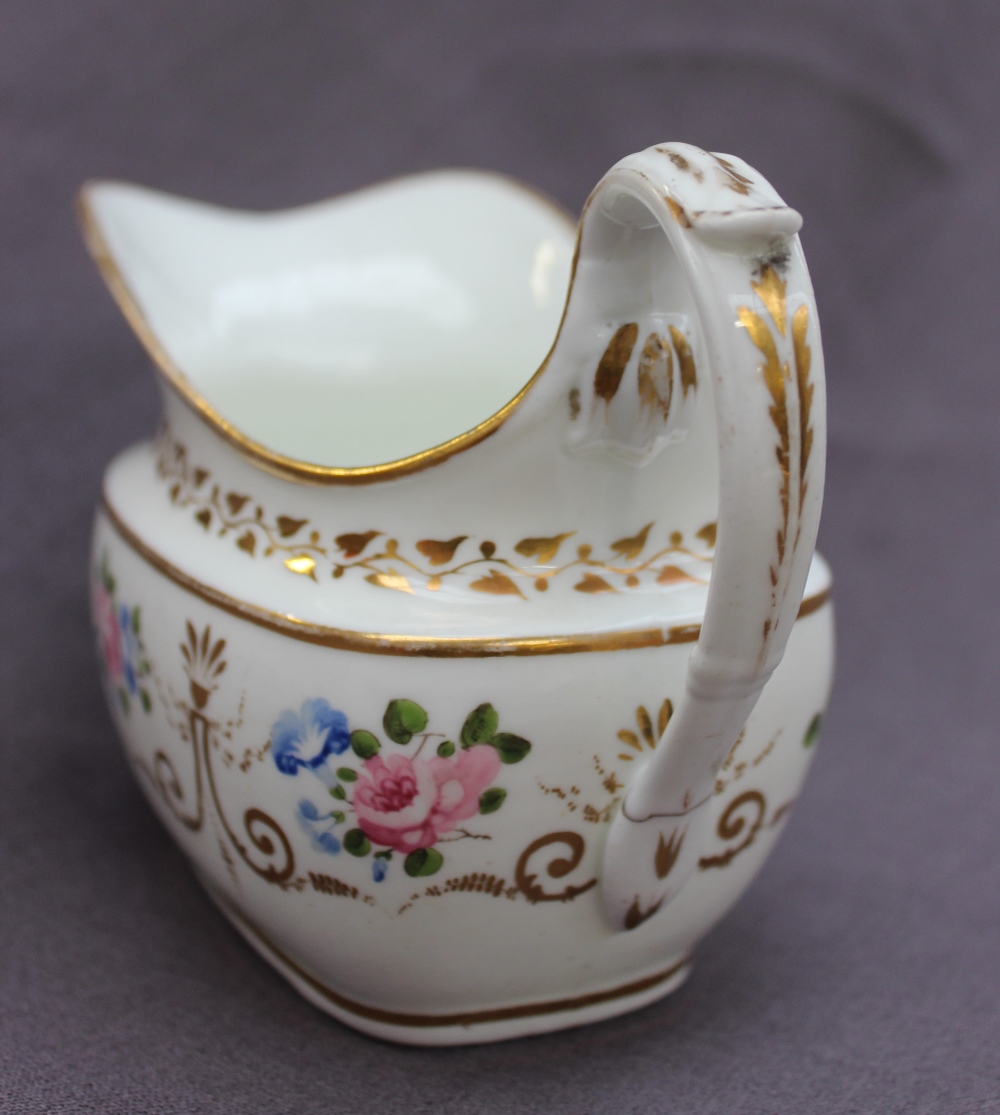 A Swansea porcelain cream jug, painted with roses and gilt swags and a scrolling handle, - Bild 4 aus 6