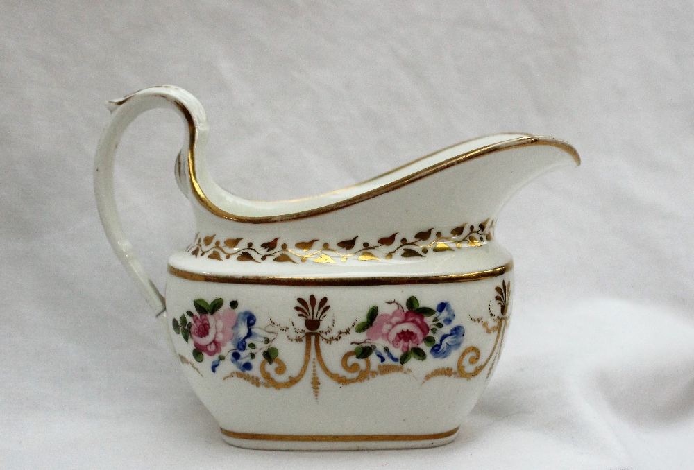 A Swansea porcelain cream jug, painted with roses and gilt swags and a scrolling handle, - Bild 2 aus 6