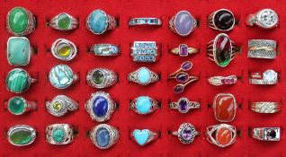 Various silver and gem set rings,