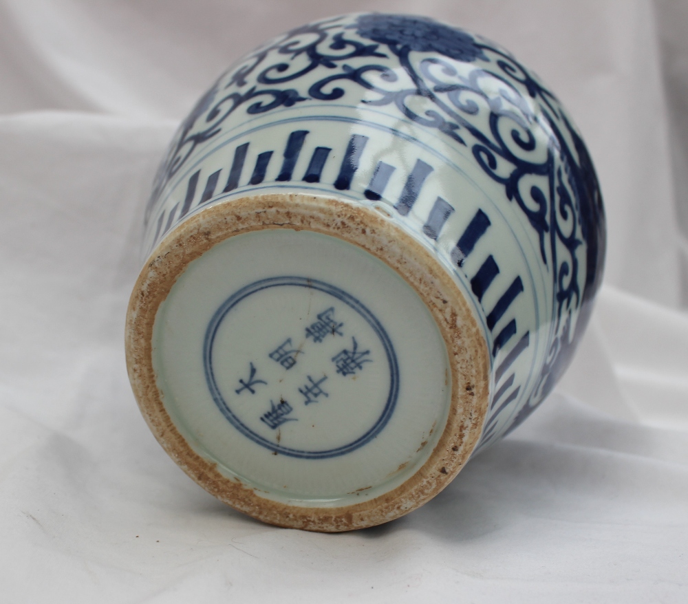 A Chinese blue and white porcelain inverted baluster vase, - Bild 6 aus 6
