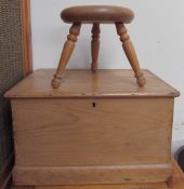 A small pine coffer together with a three legged milking stool