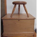 A small pine coffer together with a three legged milking stool