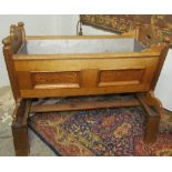 ****Unfortunately this lot has been withdran**** A Swiss pine cradle, with penwork decorated panels,