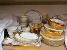 A Royal Worcester gilt decorated part dinner set together with a Royal Doulton gilt decorated part