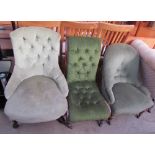 A Victorian nursing chair with a button upholstered back and scrolling feet together with two other
