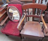 A commode elbow chair together with a Victorian library chair,