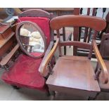A commode elbow chair together with a Victorian library chair,