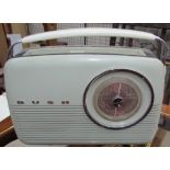 A Bush TR 82 C battery operated bakelite radio