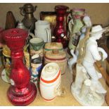 Three Wade liqueur barrels together with steins, glass candlesticks, figures, lamps,