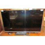 A Panasonic 32" flat screen television and remote control, (Sold as seen,