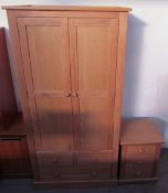 A modern ash wardrobe together with a matching bedside cabinet