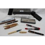 A Parker gilt metal textured fountain pen,