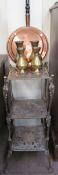 A brass three tier plant stand together with four brass vases and a copper bed warming pan