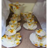 A Crown Ducal Daffodil decorated part tea set
