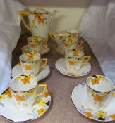 A Crown Ducal Daffodil decorated part tea set