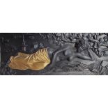 A cast iron plaque of a reclining maiden