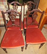 A set of four Edwardian carved and upholstered salon chairs