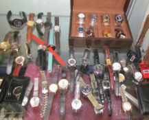 A large collection of Gentleman's wristwatches including Timex, Sekonda, T&J,