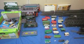 A Mamod steam railway together with Days gone and other model cars and track