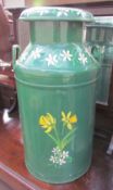 A Grundy Ltd milk churn painted green and decorated with flowers and leaves