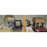 Assorted part tea sets and crystal drinking glasses together with clocks, stamps,