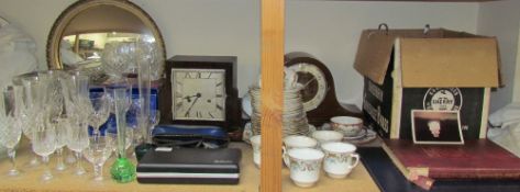 Assorted part tea sets and crystal drinking glasses together with clocks, stamps,