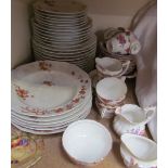 A Limoges floral decorated part dinner set together with an Aynsley part tea set,