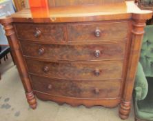 A Victorian mahogany chest with a bowed top above two short and three long drawers