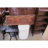 A 20th century oak bookcase together with a loom laundry basket, carved panel,