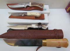 A HELLE Lappland 70 knife in leather scabbard together with a Mauser 440C knife,