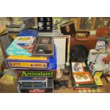 Board games together with Rubiks cubes, CD's, records, jewellery boxes, costume jewellery,