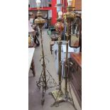 A telescopic brass standard lamp with oil reservoir converted to electricity,